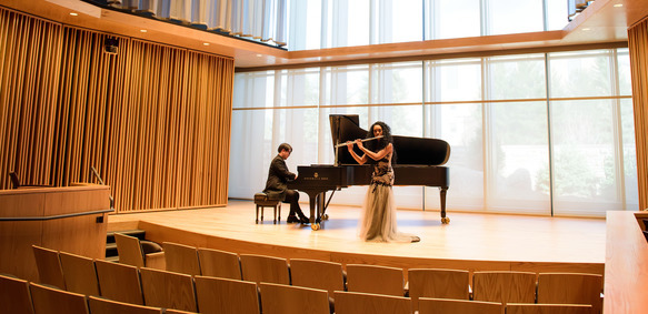 Flute player giving a recital in the BCPA Recital Hall with piano accompaniment