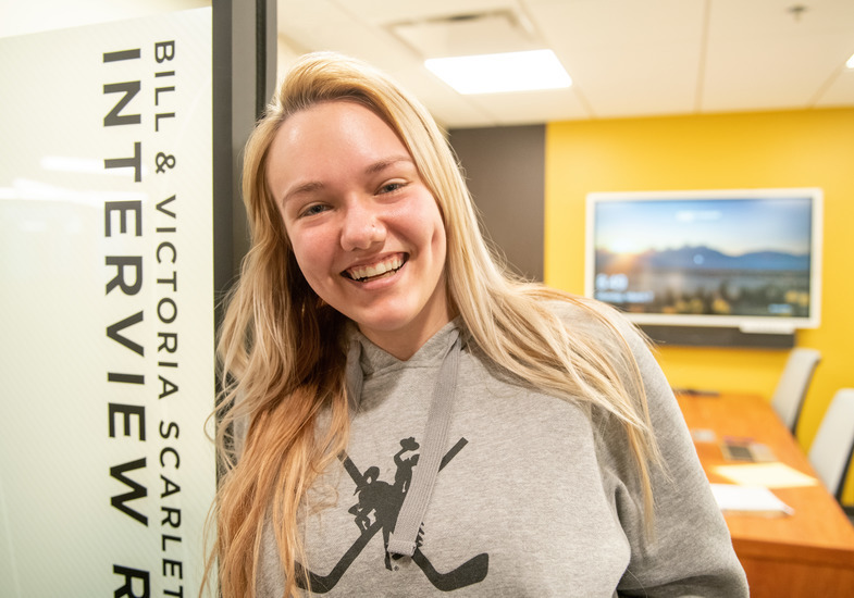 student in an interview room in the stuednt success center