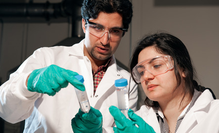 two student work in a lab together