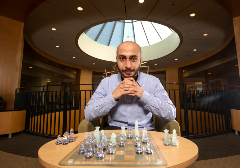 student playing chess
