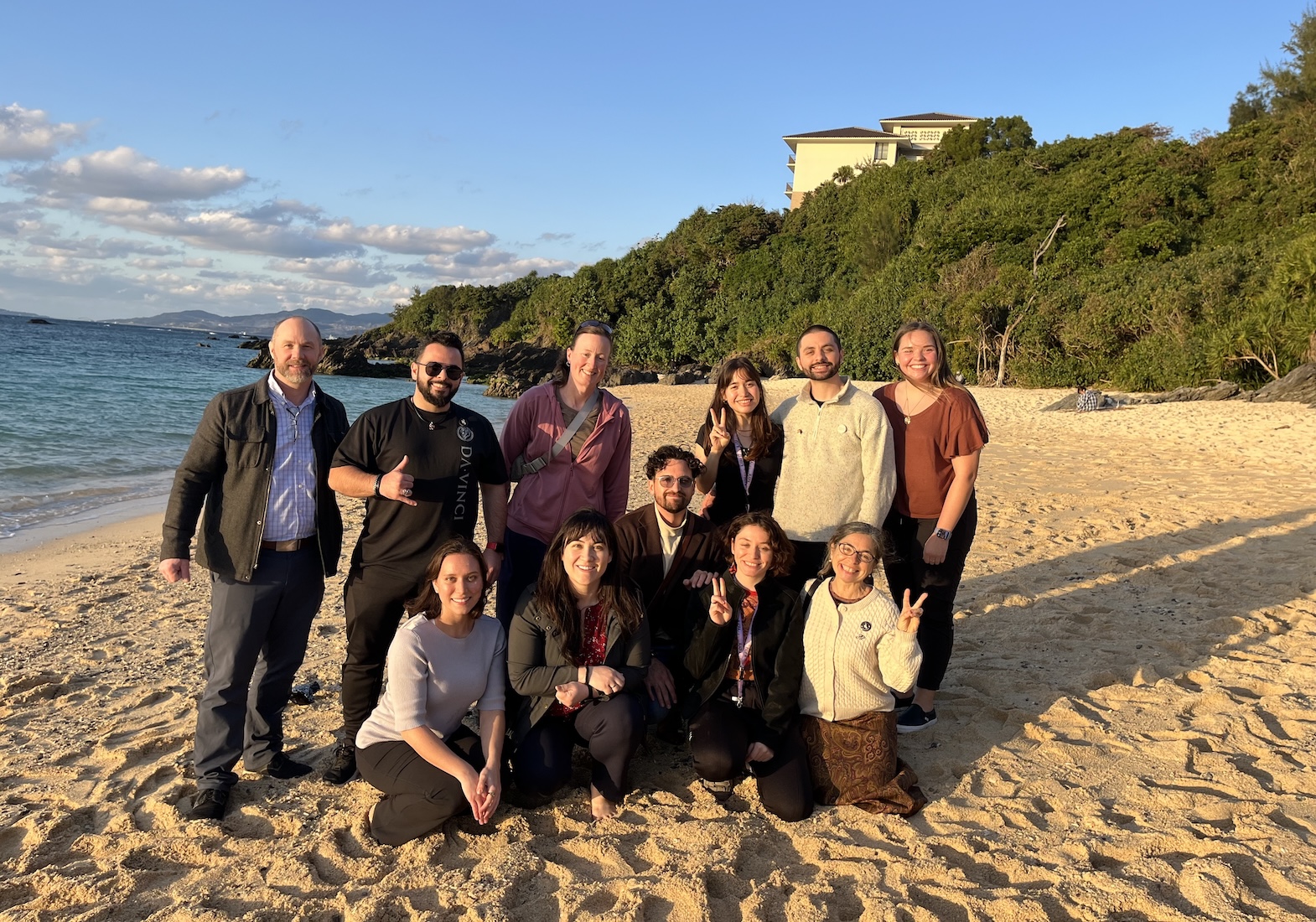 Faculty and student group photo on Okinawa beach