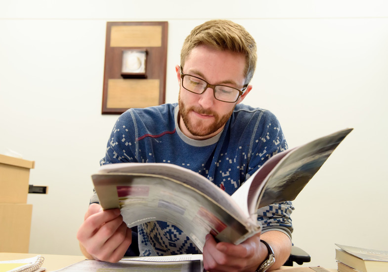 history student reading a book