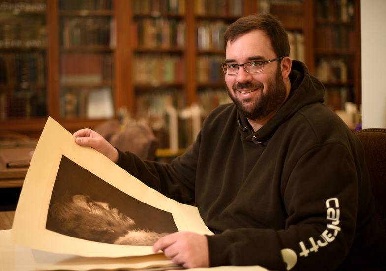 Student studying archives