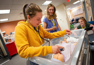 students engaging in a hands on learning activity