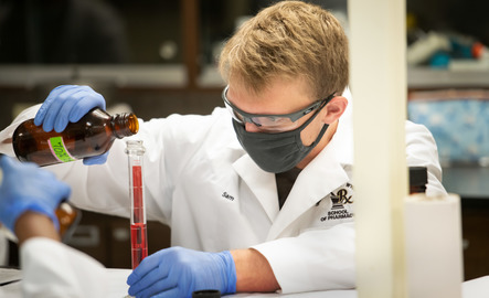A pharmacy student in a lab