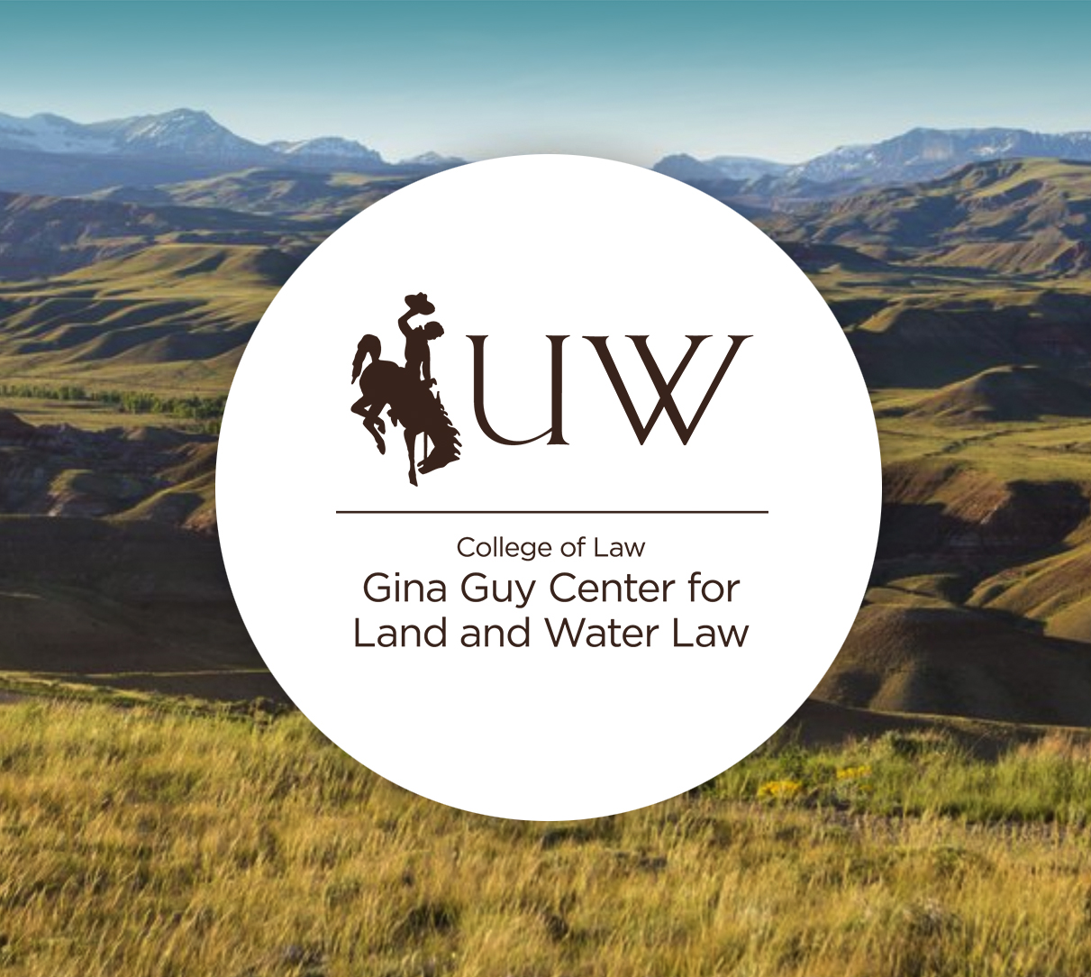 Gina Guy Center for Land and Water logo over mountains