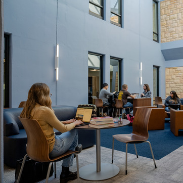 law students studying in the atrium