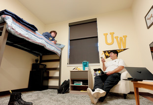 two students in thier dorm room