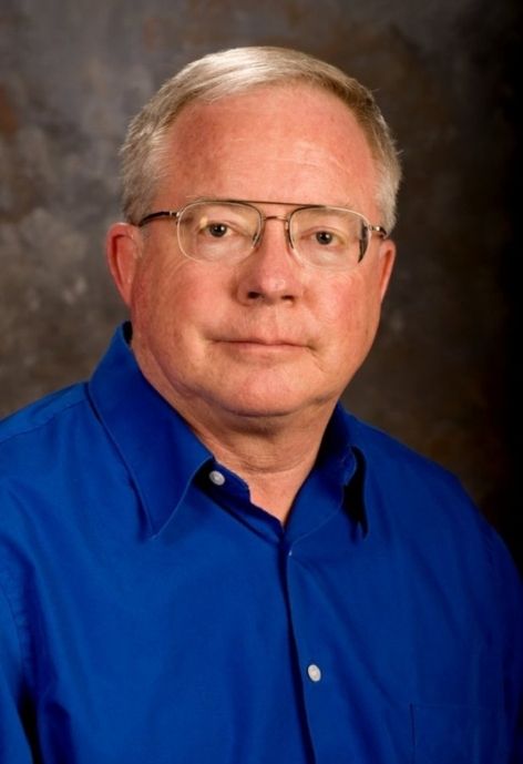 professional headshot of david e. Walrath