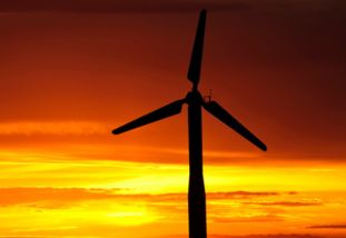 Image of wind turbine at sunset