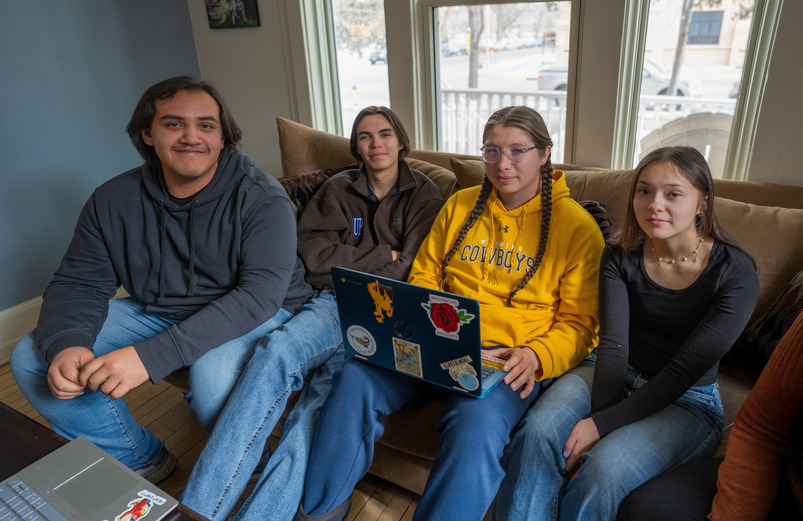 Students Smiling on Couch
