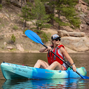 A student kayaks at Curt Gowdy state park