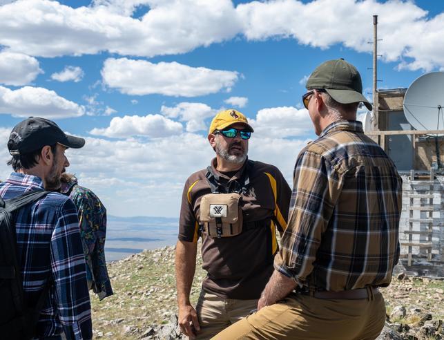 Researchers talking at the Elk Mountain Observatory