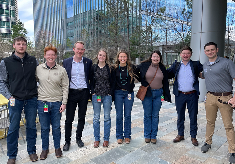 Students standing in a row at Shell HQ