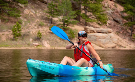 A UW student kayaks at a nearby outdoor recreation area.