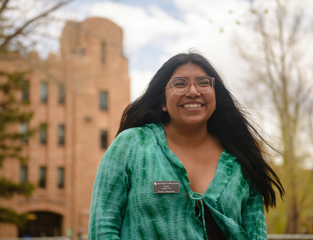 Student smiling on campus
