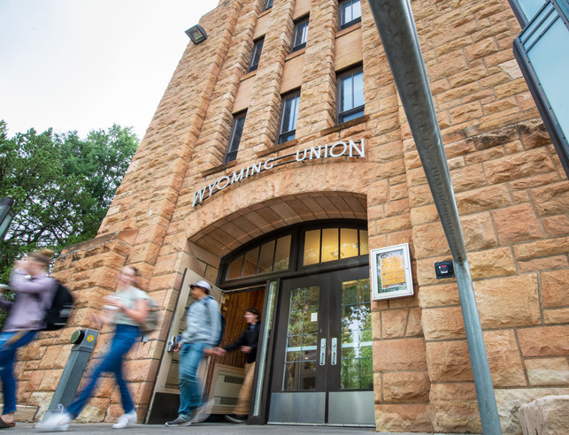 Outside the Union building and students walking down the steps