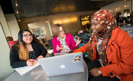 Students working in a coffee shop