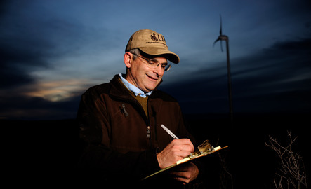 Mechanical engineering professor taking notes